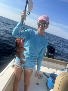 Reeling in the deep: Red Grouper hooked on a perfect day off Panama City Beach!