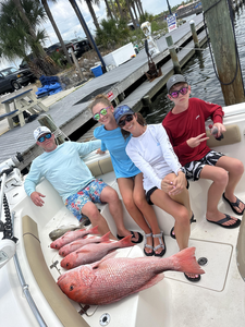 Reeling in a huge Red Snapper off Panama City Beach!