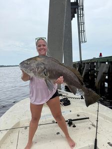 A person fishing in Panacea