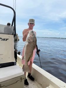 A person fishing in Panacea