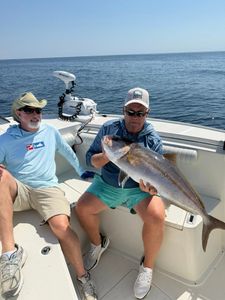 A couple enjoying a fishing trip in Pensacola