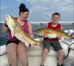 Two people fishing in Pensacola