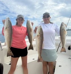 Two people fishing in Pensacola