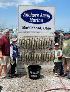 Five people enjoying a day of fishing at Lakeside Marblehead