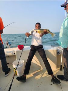 Person fishing at lakeside in Marblehead