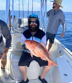 Two people enjoying a fishing trip in Orlando