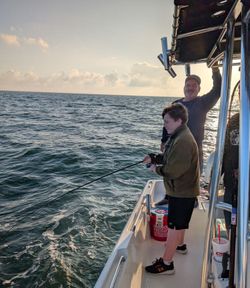 Two people enjoying a fishing trip in Orlando
