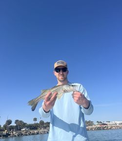 A lone fisherman casting line in Florida
