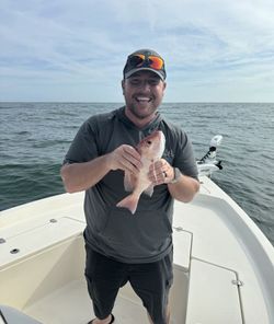 One fisherman catching a fish in FL