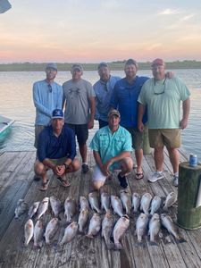 Reeling in redfish—another successful day!