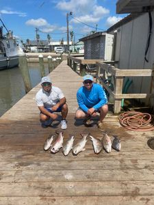 Redfish glory—hooked and proud!