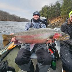 Photograph of a 47-inch rainbow trout caught while fishing in MI.