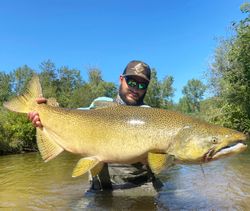 A single angler fishing in Michigan with a great catch