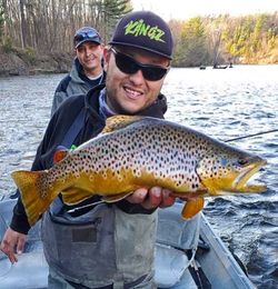 Fisherman holding 19-inch sea trout in MI