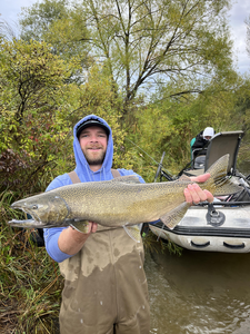 Great catch using fly fishing techniques! Partly cloudy conditions made for an exciting day on the water.