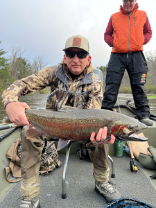 Nice rainbow trout on the fly in partly cloudy conditions!