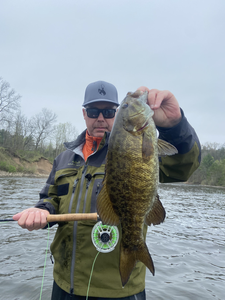 Nice smallmouth bass on the fly today! Great fishing conditions despite the cloudy skies.