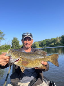 Big Smallmouth Bass bites in clearing skies!