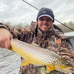 A person fishing for a sea trout in Stanwood