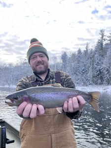 Nice rainbow trout on the fly! Winter fishing can be exciting with the right technique.
