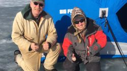 Two anglers enjoying a fishing trip in Vergennes