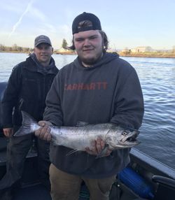 A coho salmon being caught while fishing in Oregon