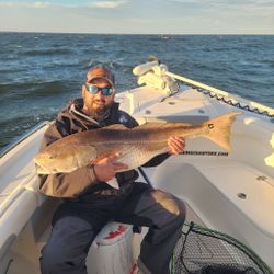 Angler with a redfish in North Carolina