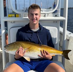 Two people enjoying fishing tours in NC