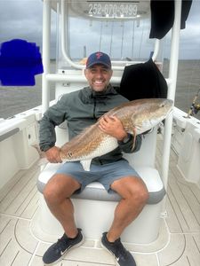 Angler fishing in the beautiful Oriental location