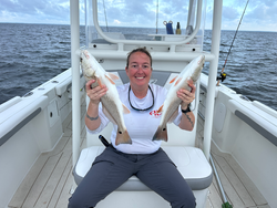 Double redfish delight on a stormy day in Oriental!