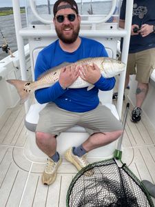 A redfish caught on a fishing tour in Oriental