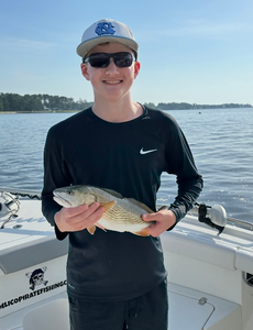 Hooked a tasty Redfish on a perfect partly cloudy day!