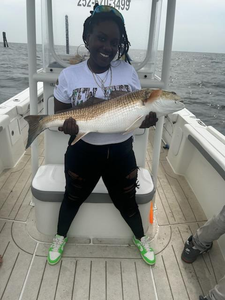 Reeling in a big catch at the local park!