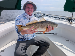 Big redfish snagged on a clever light tackle setup in Oriental, NC!