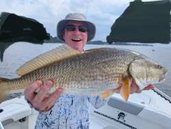 Big Redfish reeled in on a stormy day in Oriental!