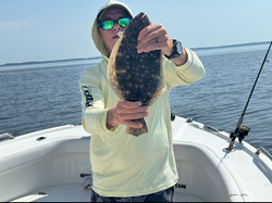 15-inch Southern Flounder landed under partly cloudy skies - a great day for fishing!