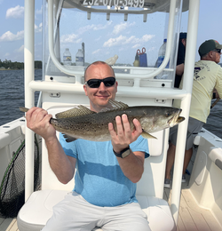 A thrilling catch of a spotted weakfish on a light tackle adventure in Minnesott Beach!