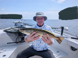 Hooked a big Spotted Weakfish while battling the afternoon storms in Oriental, NC!