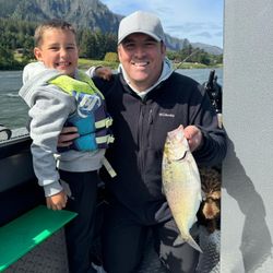 A photo of two people fishing in Oregon