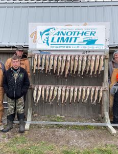 Three people enjoying fishing trip in OH
