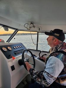 Fisherman enjoying lakeside view at Lakeside Marblehead