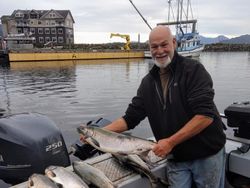 Angler with 14-inch fish in Big Rapids