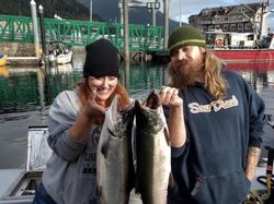 Two coho salmon caught while fishing in Big Rapids