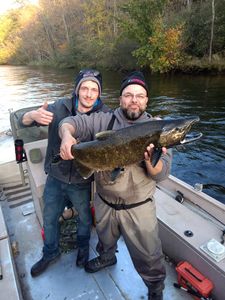 Two people fishing in MI
