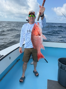 Hooked a big red snapper while enjoying the partly cloudy weather!