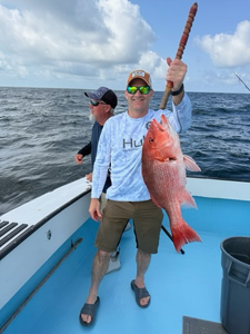 Reeled in a big red snapper with some deep sea jigging and trolling techniques in Destin, FL!