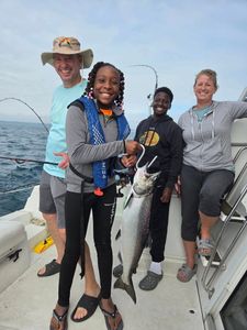 Successful chinook salmon fishing trip on boat in Port Washington WI