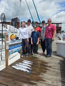 Fresh caught fish displayed on dock after successful fishing charter in Port Washington WI
