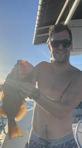 Fisherman catches a fish in Atlantic City