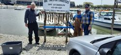 Three people fishing at Oak Harbor